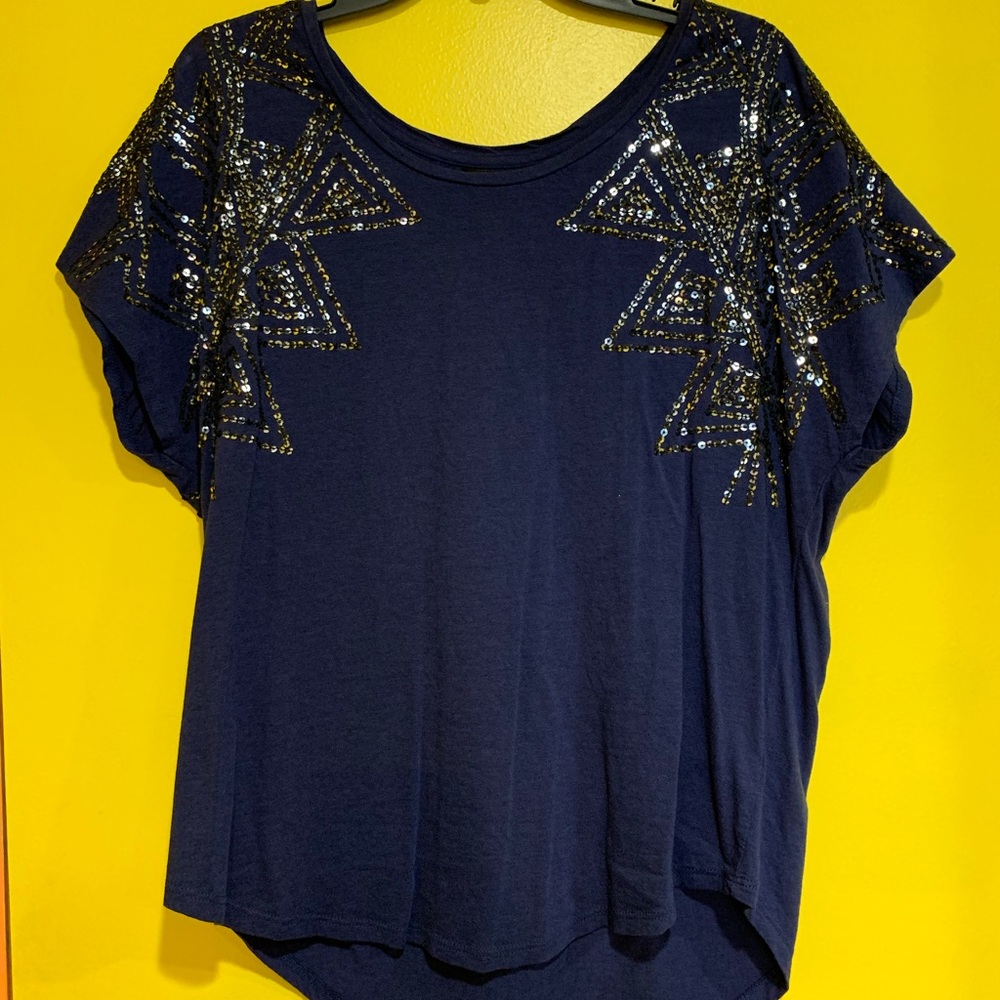 Woman’s blue sequence blouse